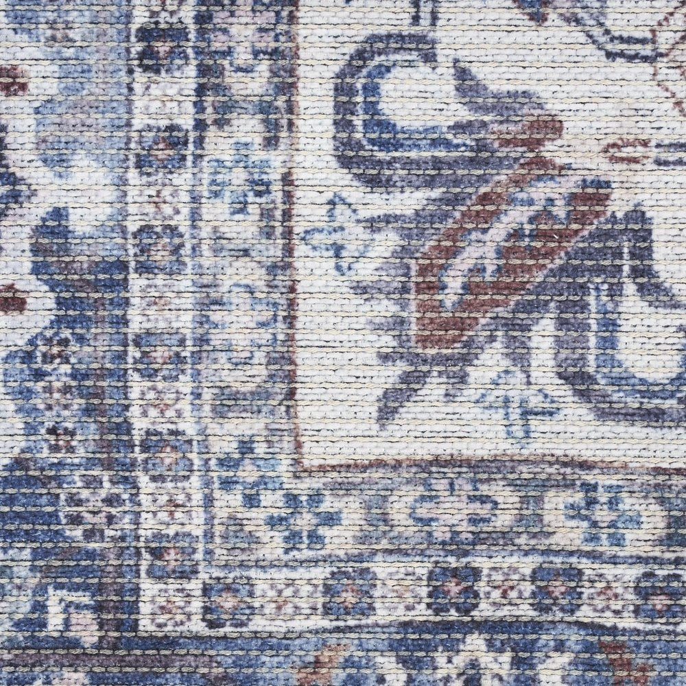 5' X 7' Gray Ivory and Blue Floral Power Loom Distressed Washable Area Rug