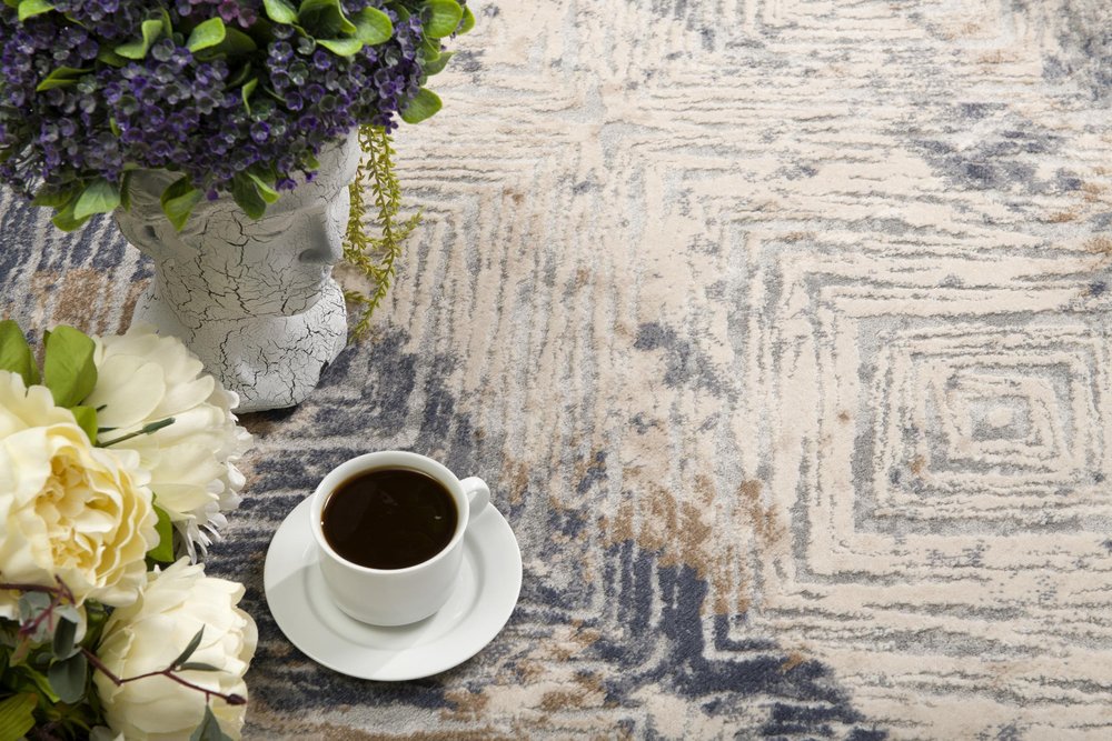 9' X 12' Blue and Ivory Abstract Distressed Area Rug