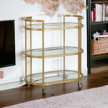 Brass Steel And Glass Oval Rolling Bar Cart