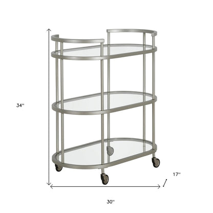 Nickel Steel And Glass Oval Rolling Bar Cart