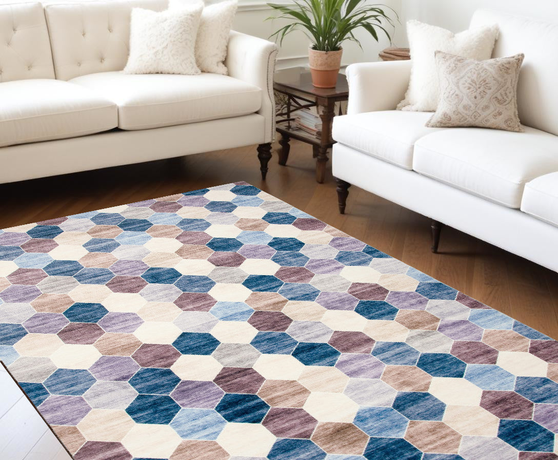 7' X 10' Ivory and Blue Geometric Distressed Area Rug