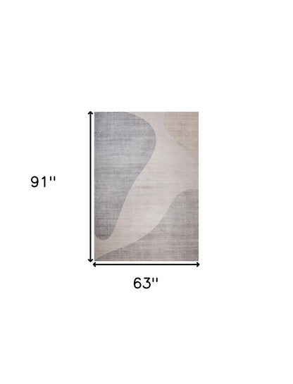 5' X 8' Beige and Brown Abstract Distressed Area Rug