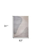 5' X 8' Beige and Brown Abstract Distressed Area Rug