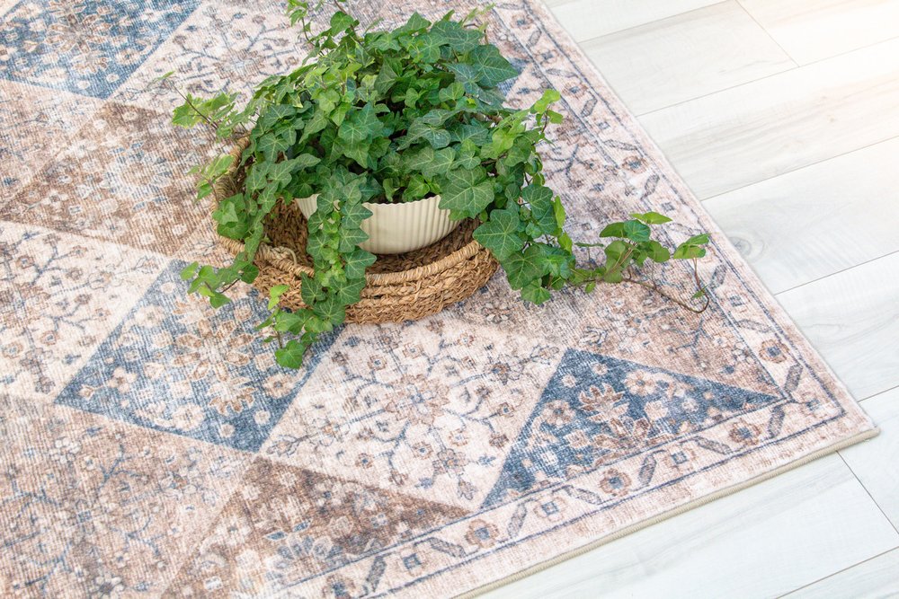 5' X 8' Brown and Blue Floral Distressed Area Rug