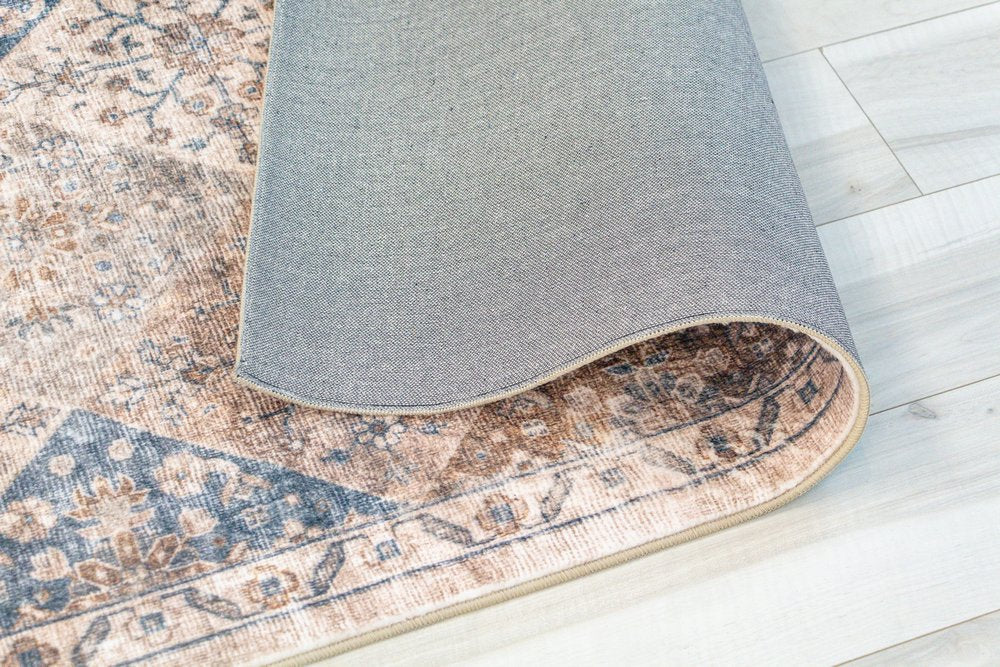 5' X 8' Brown and Blue Floral Distressed Area Rug