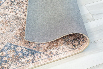 5' X 8' Brown and Blue Floral Distressed Area Rug