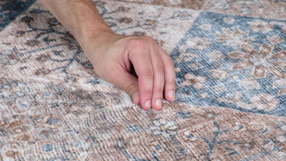 5' X 8' Brown and Blue Floral Distressed Area Rug