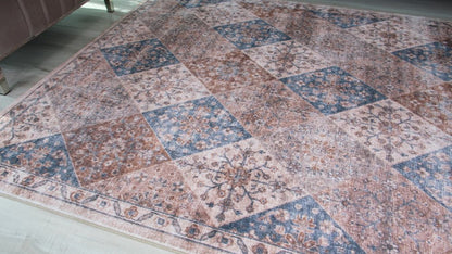 7' X 10' Brown and Blue Floral Distressed Area Rug