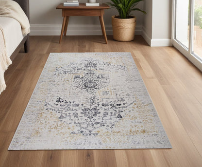 4' X 6' Gray and Gold Oriental Area Rug