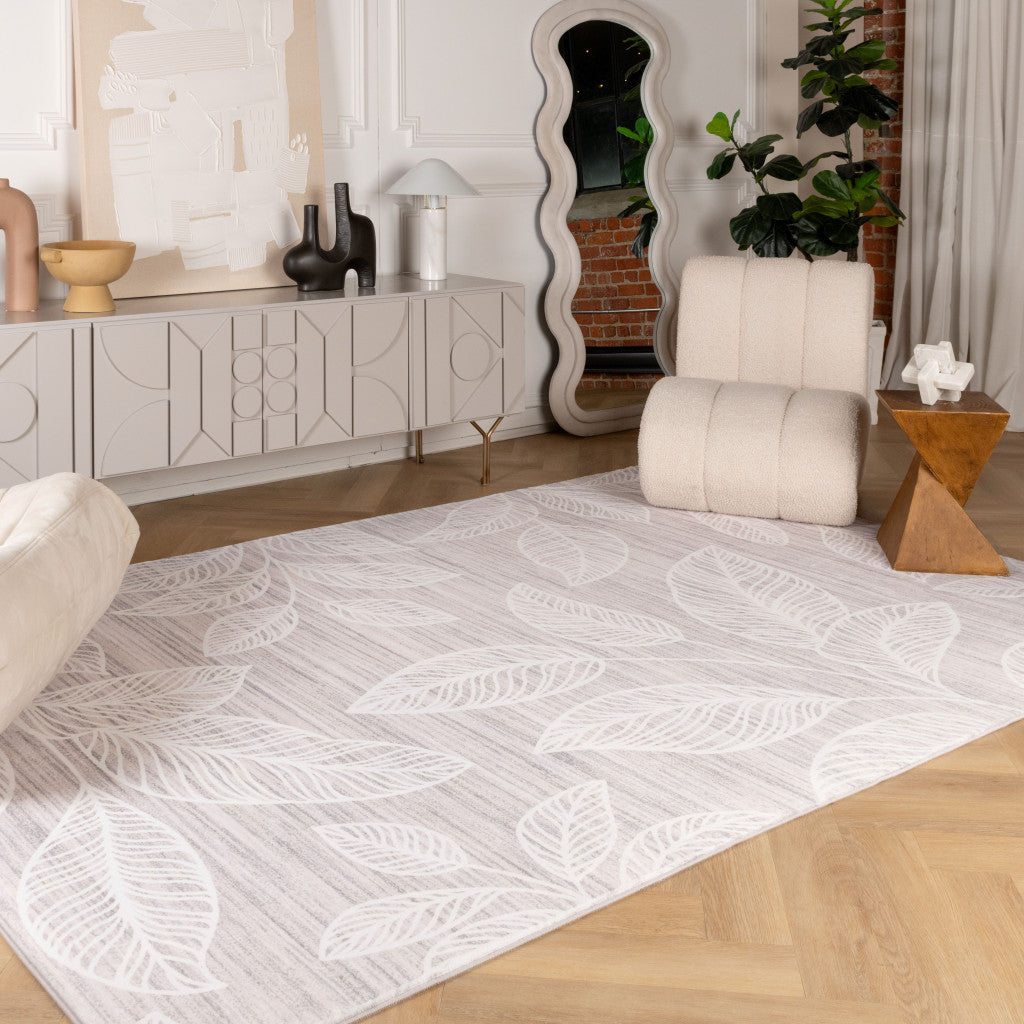 5' X 8' Beige and Ivory Floral Distressed Area Rug