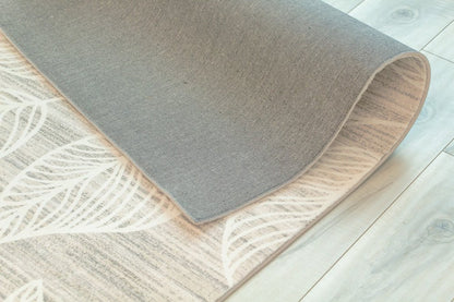 7' X 10' Beige and Ivory Floral Distressed Area Rug
