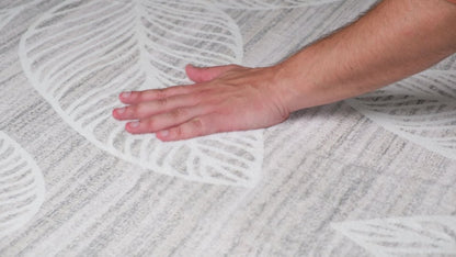 7' X 10' Beige and Ivory Floral Distressed Area Rug
