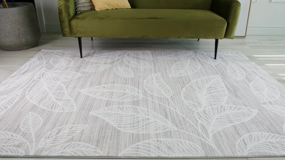 7' X 10' Beige and Ivory Floral Distressed Area Rug
