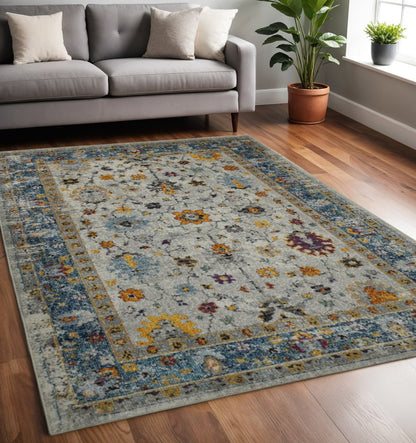8' X 11' Gray Blue And Orange Area Rug
