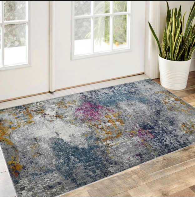 5' X 7' Blue and Pink Abstract Power Loom Area Rug