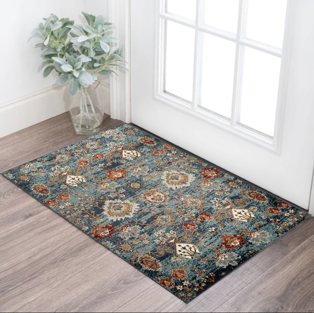 5' X 8' Ivory Rust And Teal Oriental Area Rug
