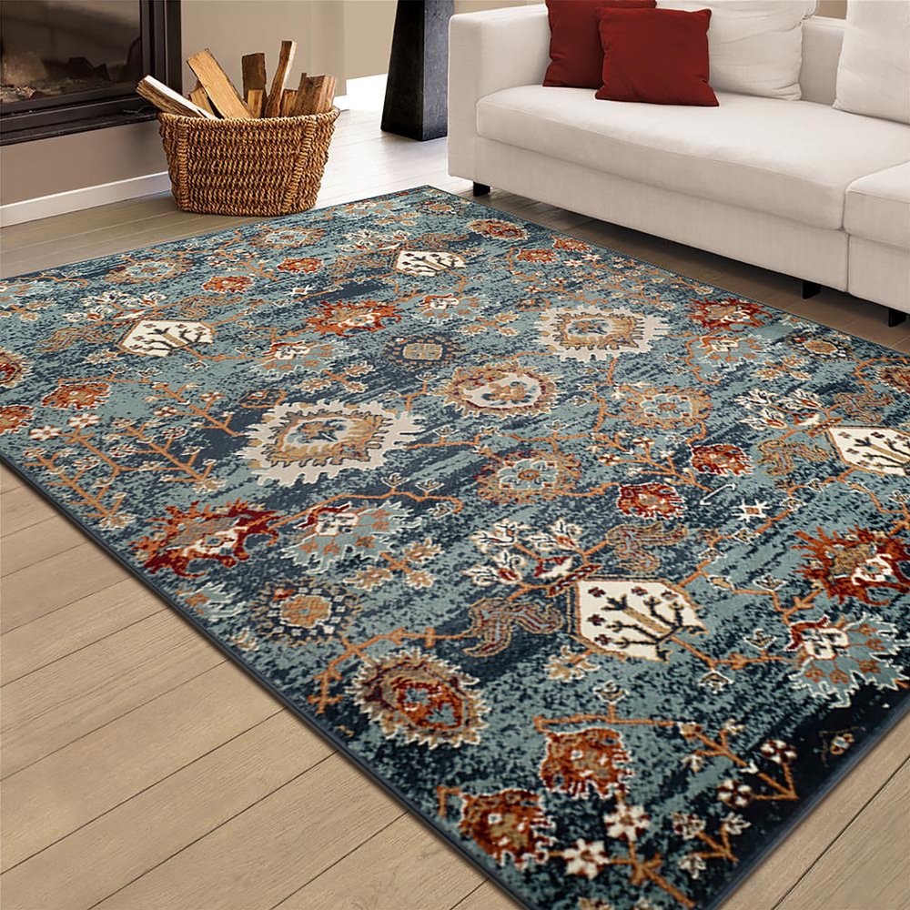 5' X 8' Ivory Rust And Teal Oriental Area Rug