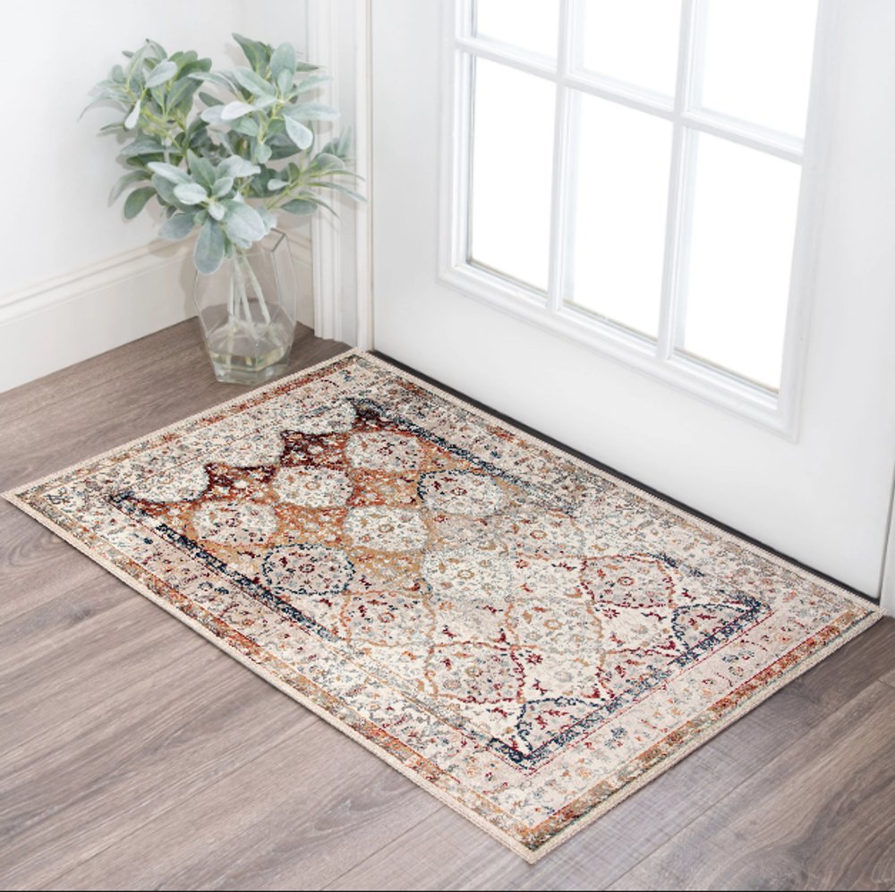 8' X 10' Beige Rust and Navy Floral Medallion Power Loom Area Rug