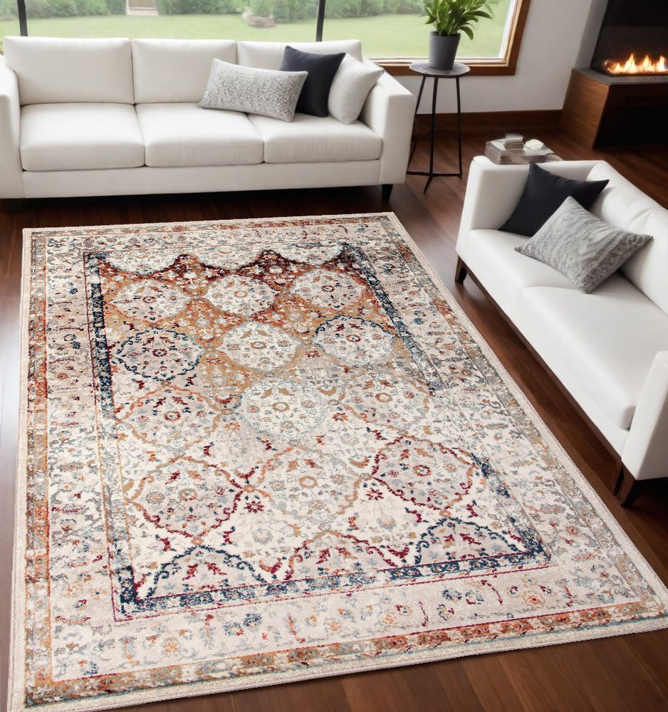8' X 10' Beige Rust and Navy Floral Medallion Power Loom Area Rug