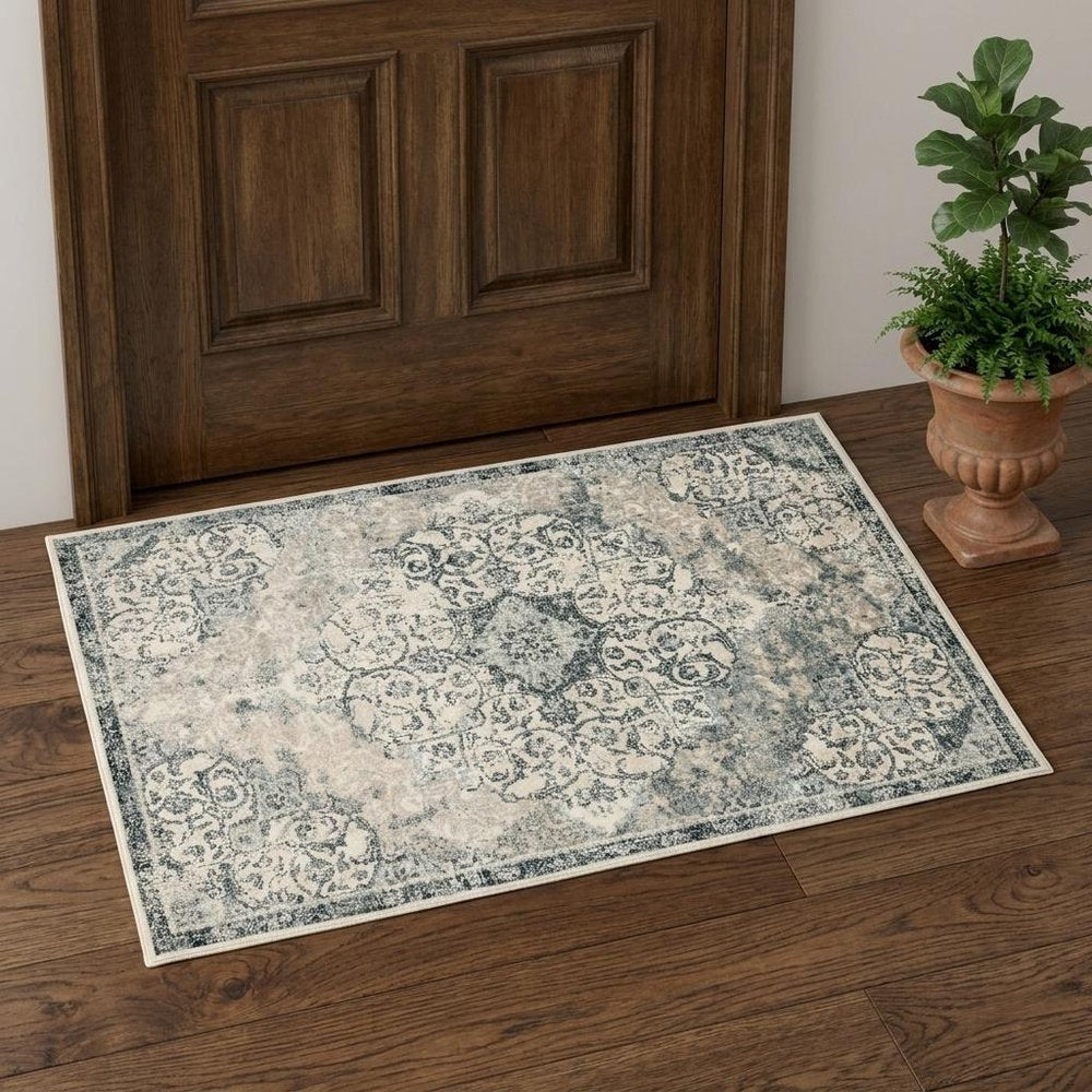 5' X 8' Charcoal and Gray Medallion Power Loom Area Rug