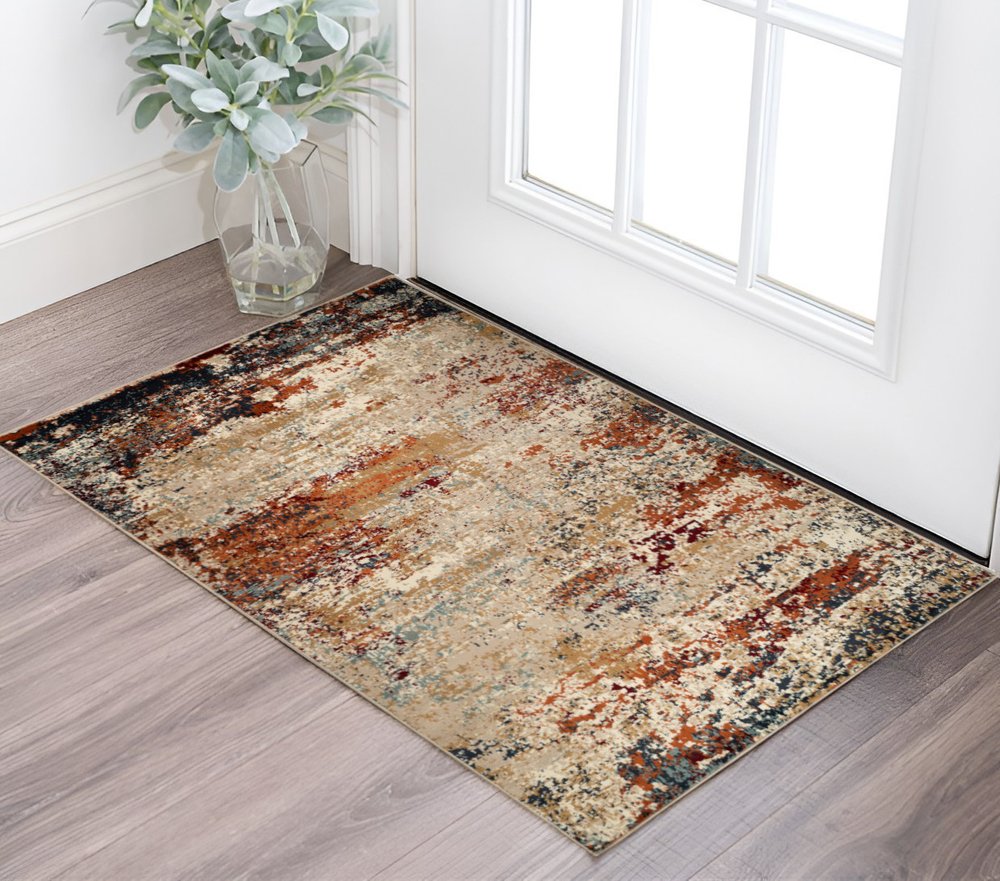 5' X 8' Orange and Black Abstract Power Loom Area Rug