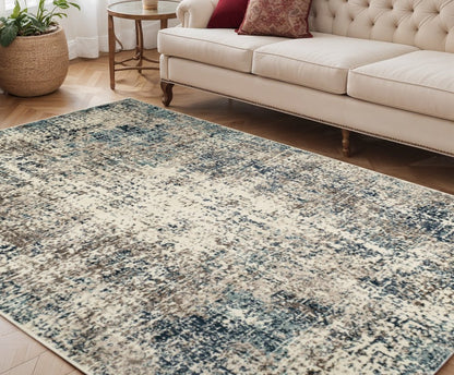 5' X 8' Ivory Blue and Gray Abstract Power Loom Area Rug