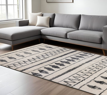 10' Cream Black And Gray Geometric Shag Runner Rug