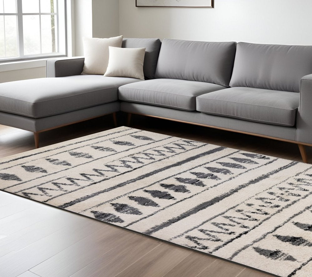 8' X 12' Cream Black And Gray Geometric Shag Area Rug