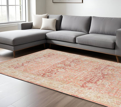 9' X 13' Salmon And Tan Floral Area Rug