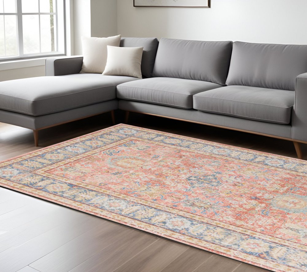 9' X 13' Coral And Blue Oriental Area Rug