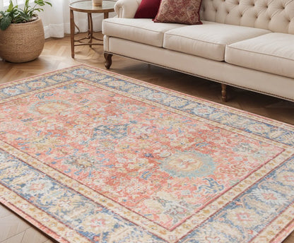 9' X 13' Coral And Blue Oriental Area Rug