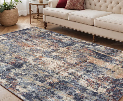 5' X 8' Ivory Orange And Dark Gray Abstract Area Rug