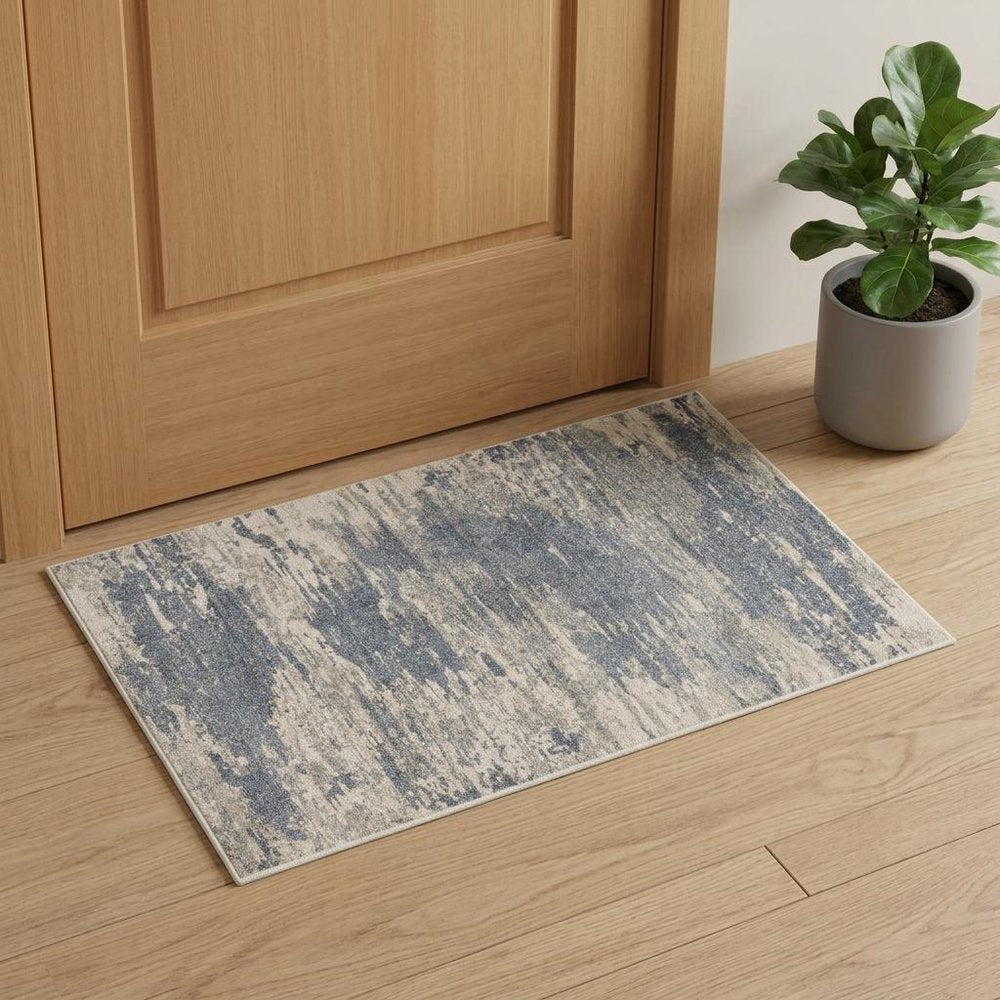 2' X 3' Ivory Blue And Gray Abstract Area Rug