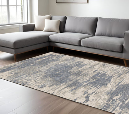 2' X 3' Ivory Blue And Gray Abstract Area Rug