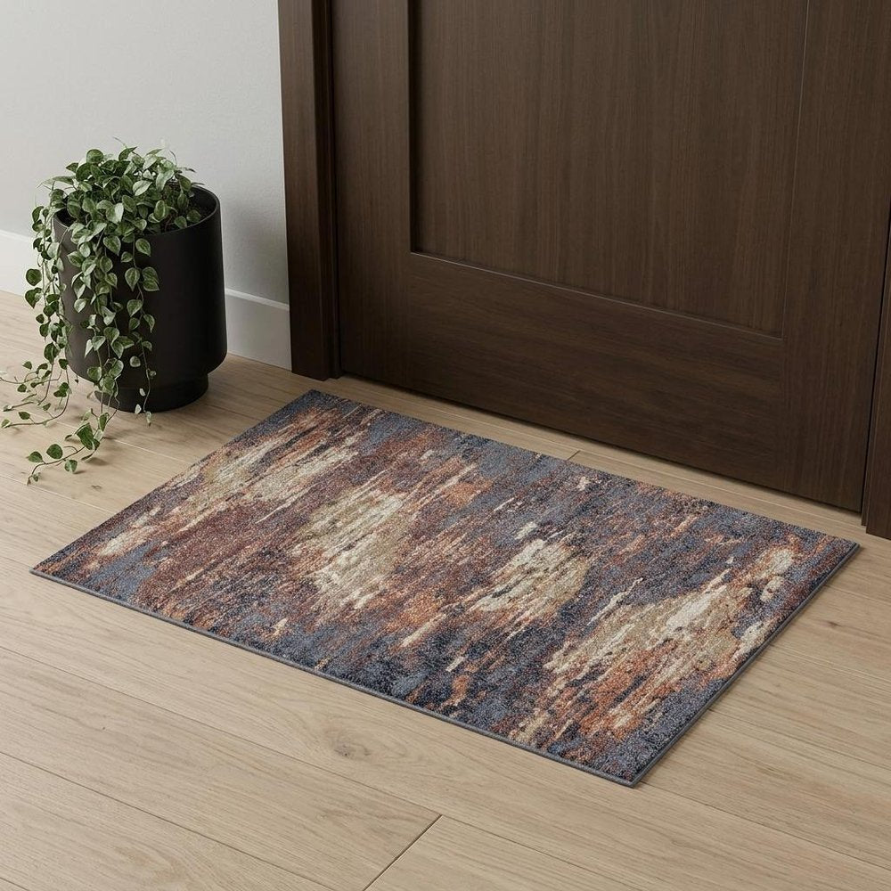 9' X 12' Ivory Rust And Blue Abstract Area Rug