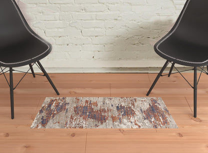 2' X 3' Beige Rust and Blue Abstract Power Loom Area Rug