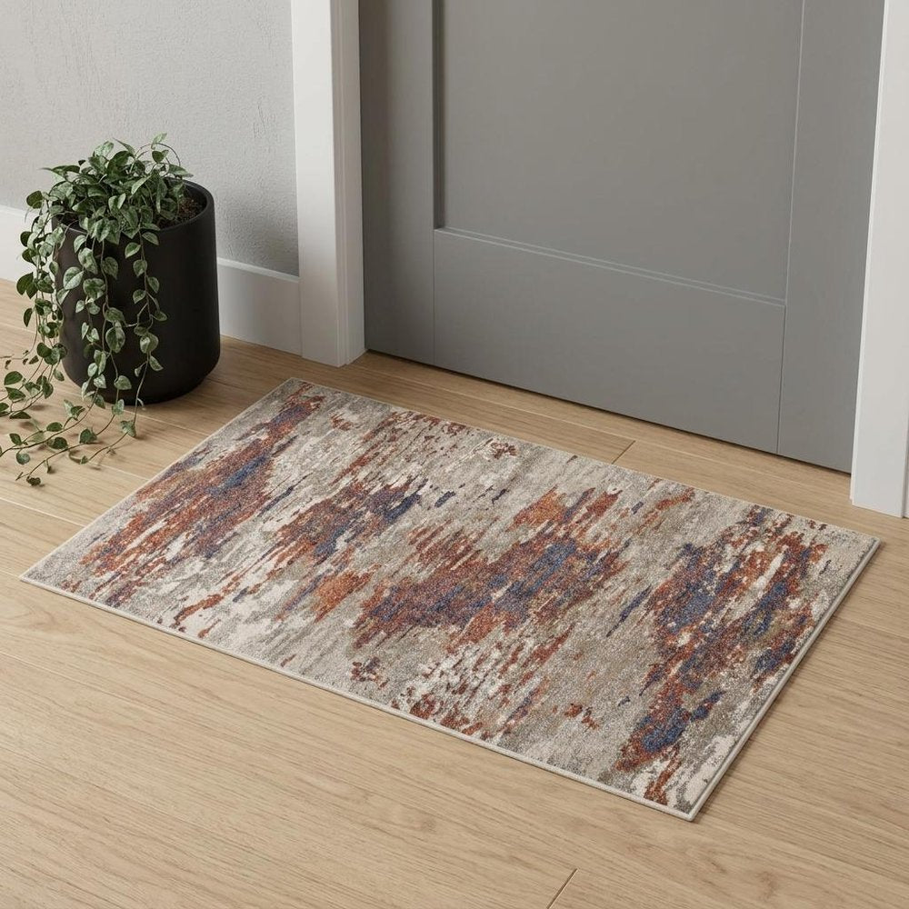 2' X 3' Beige Rust And Blue Abstract Area Rug