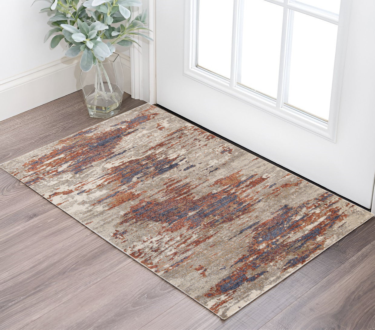 2' X 3' Beige Rust And Blue Abstract Area Rug