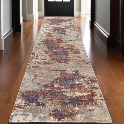 2' X 3' Beige Rust And Blue Abstract Area Rug