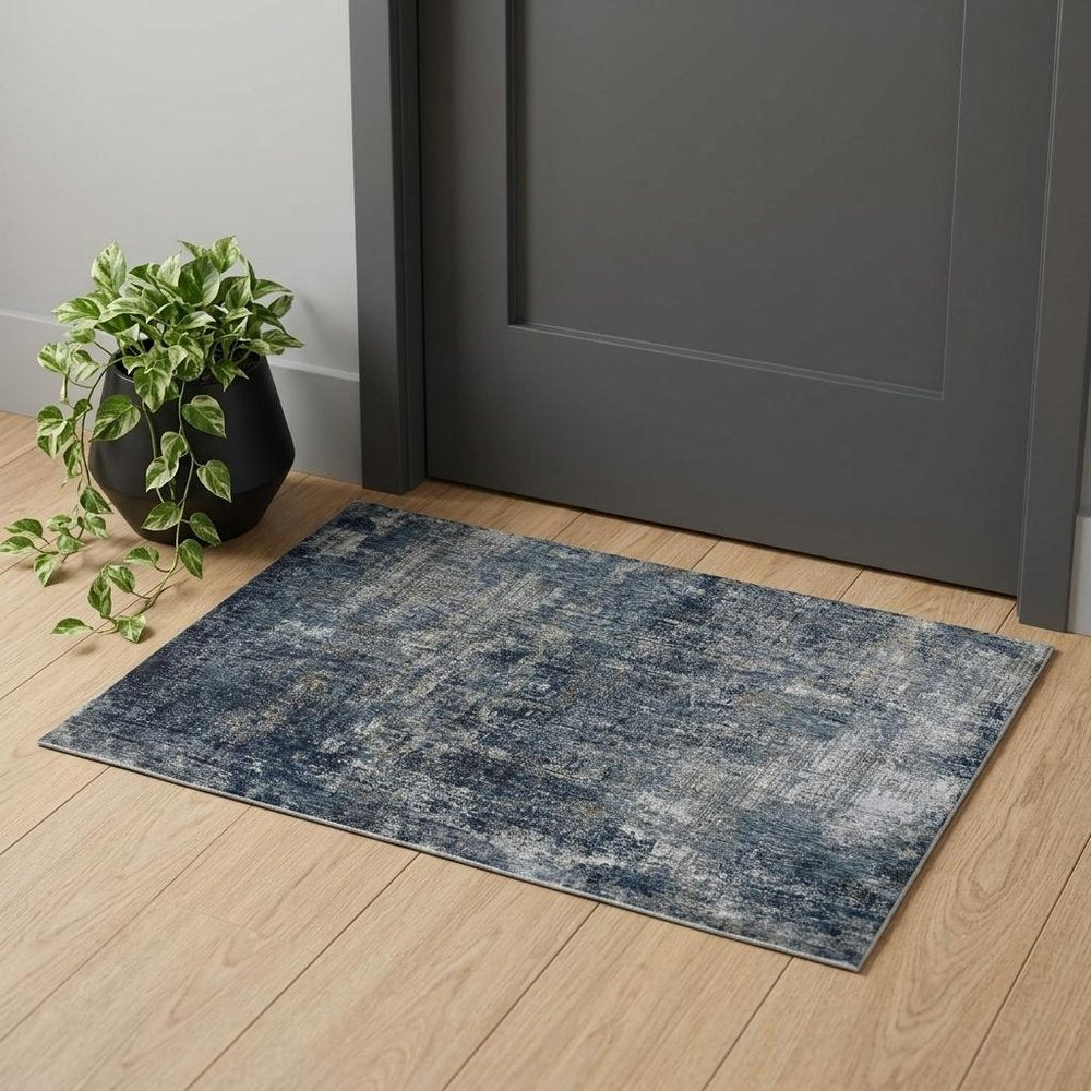 2' X 3' Ivory And Gray Abstract Area Rug