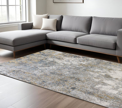 9' X 12' Ivory Blue And Yellow Abstract Area Rug