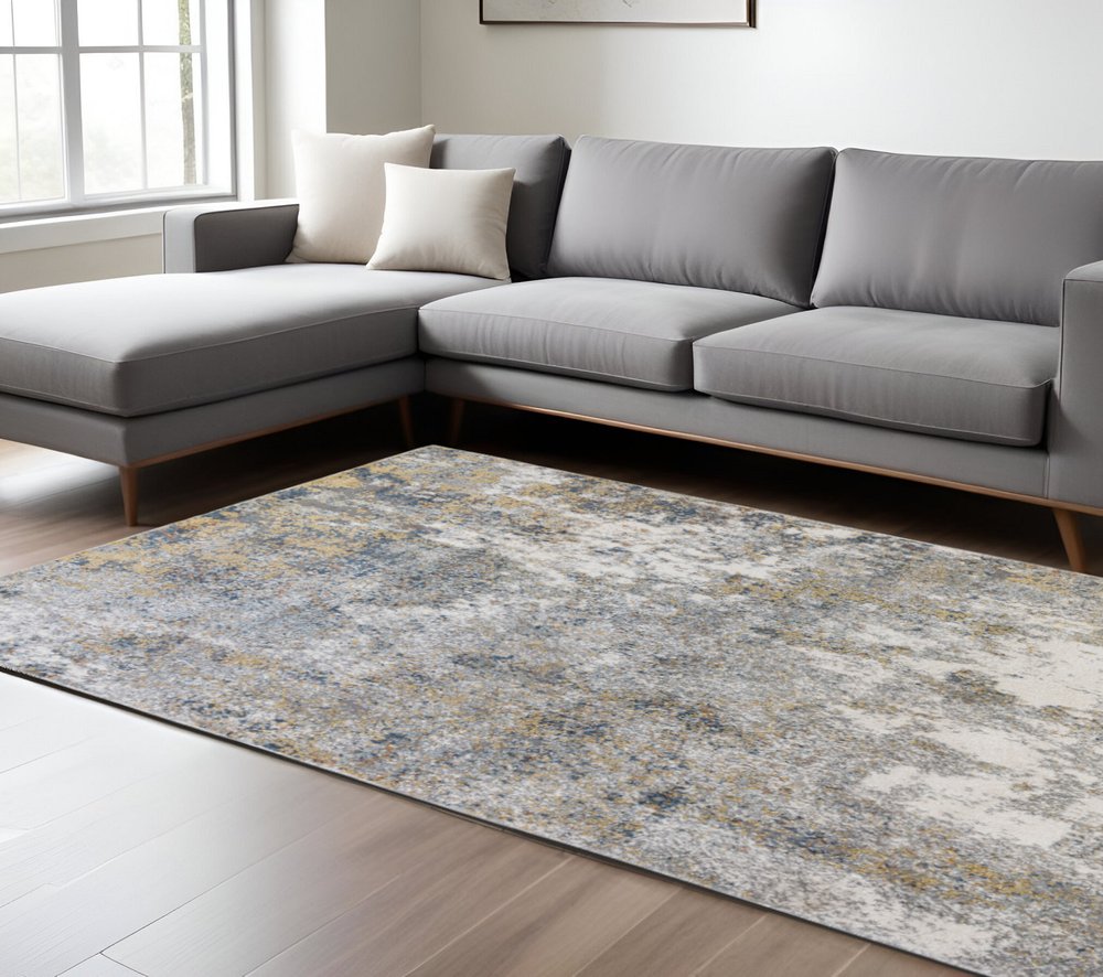 9' X 12' Ivory Blue And Yellow Abstract Area Rug