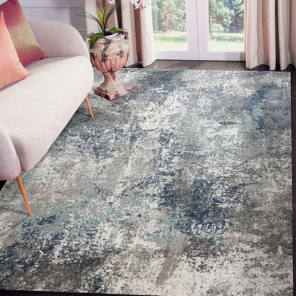 9' X 12' Ivory Blue And Gray Abstract Area Rug
