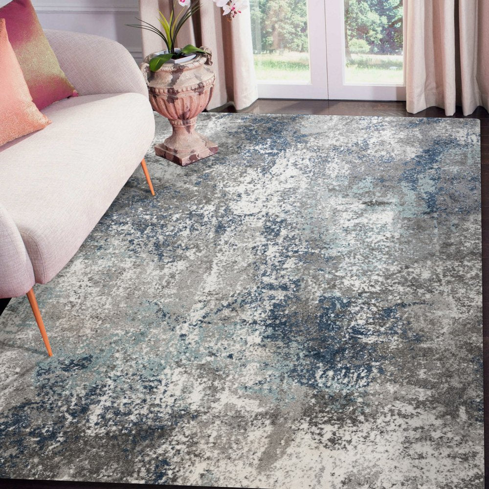 9' X 12' Ivory Blue And Gray Abstract Area Rug
