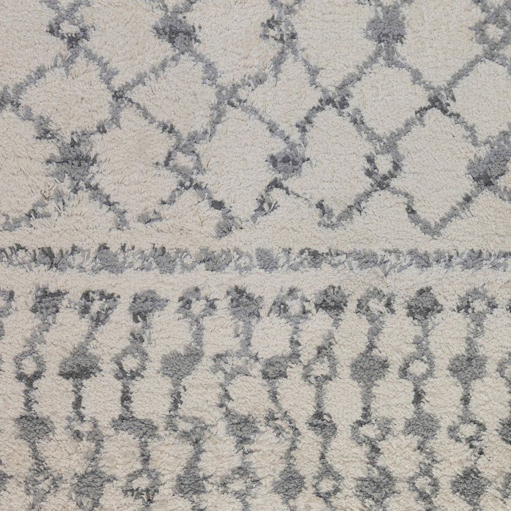 5' X 8' Gray And Ivory Geometric Shag Area Rug