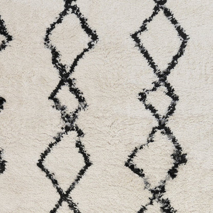 5' X 8' Ivory And Black Geometric Shag Area Rug