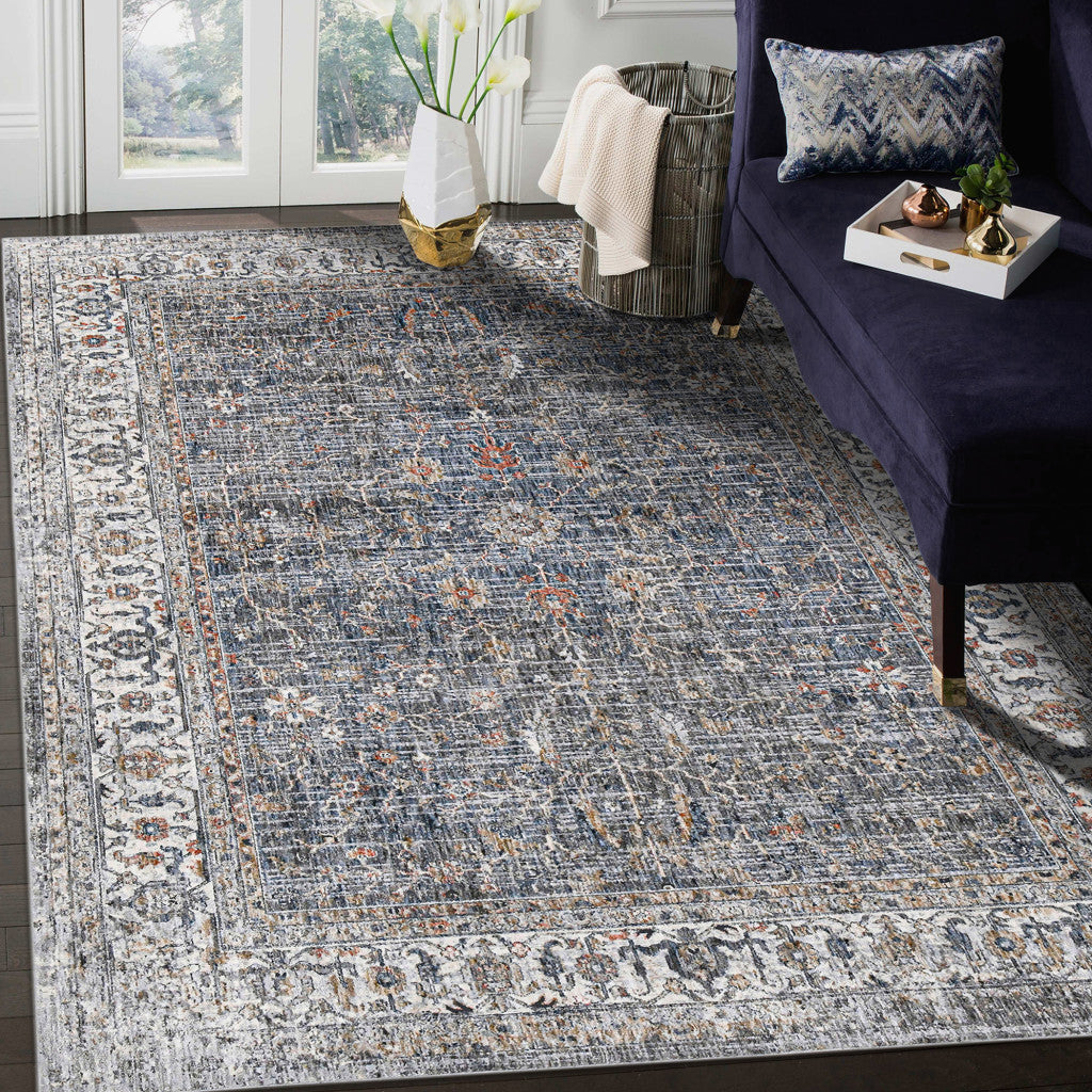 9' X 12' Ivory Navy and Orange Oriental Power Loom Area Rug