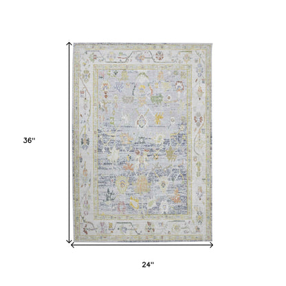 2' X 3' Ivory Blue and Orange Oriental Power Loom Worn Faded Area Rug