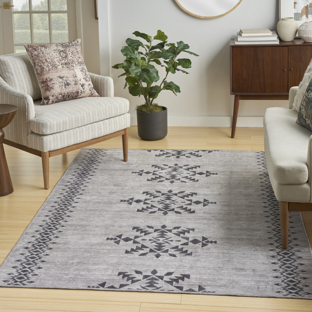 5' X 7' Gray and Ivory Geometric Power Loom Washable Area Rug