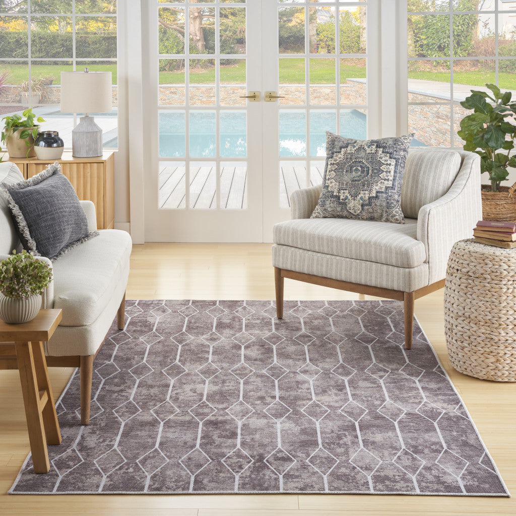 5' X 7' Brown and Ivory Geometric Power Loom Washable Area Rug